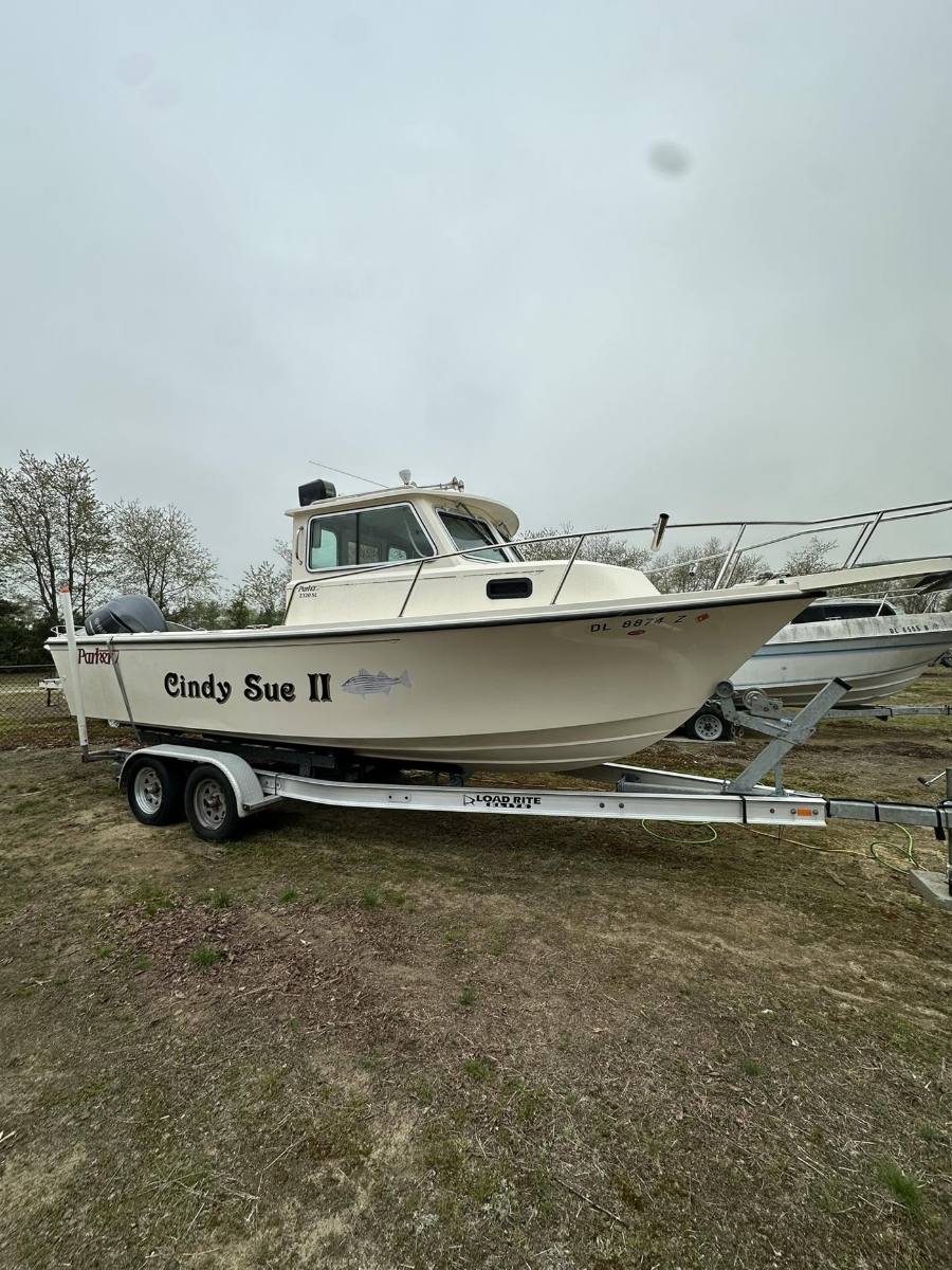 Boat being detailed at the dock